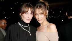 Bella Hadid looks giddy as she reunites with Carla Bruni