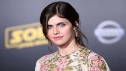 Alexandra Daddario looks stunning as she walks down the red carpet with pals