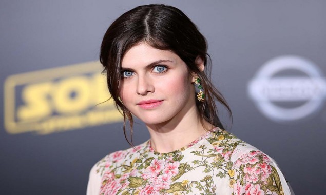 Alexandra Daddario looks stunning as she walks down the red carpet with pals