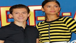 Zendaya relaxes in the car as boyfriend Tom Holland loads up the SUV