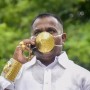 Indian man wears a face mask made out of gold to fight Covid