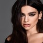 Dua Lipa flaunts her toned body in this glittering attire