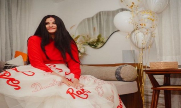 Rhea Kapoor shows off her alta-decorated feet