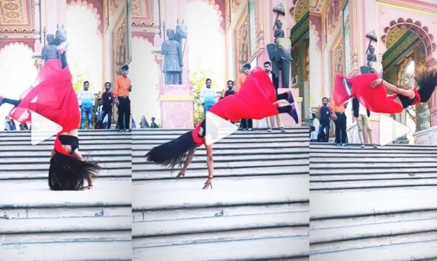 Girl performs amazing backflip in red saree, watch viral video