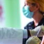 Half of total US population fully vaccinated