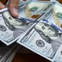 Rupee ends firmer against dollar