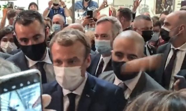 Macron hit with egg during restaurant fair visit