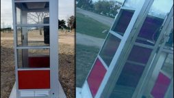 An old and dilapidated phone booth in the park was stolen