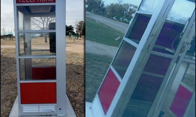 An old and dilapidated phone booth in the park was stolen