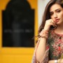 Sana Javed wears a plunging neckline shirt while shooting for her drama
