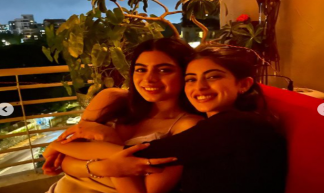 Navya grins as she poses with her ‘love’ Khushi in front of the fairy lights