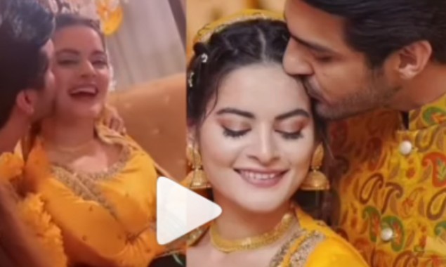 WATCH: Video of Ahsan Mohsin Kissing Minal Khan in Mayun event goes viral