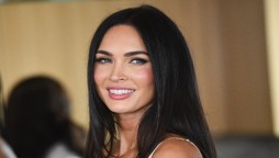 Megan Fox turns up the heat in this sheer nude-coloured outfit