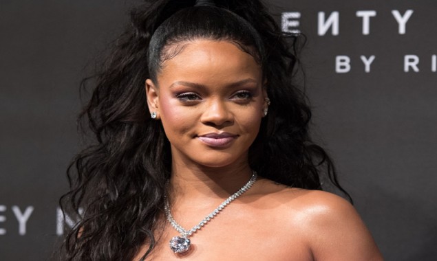 Rihanna slays in a pink & purple crotchless wear to promote her brand