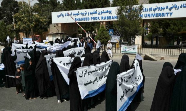 Afghan women wearing full-face veils hold rally in support of Taliban