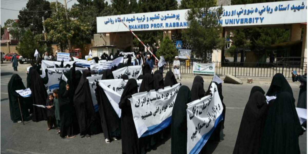 Afghan women wearing full-face veils hold rally in support of Taliban