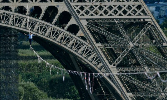 French daredevil takes hair-raising Seine tightrope walk