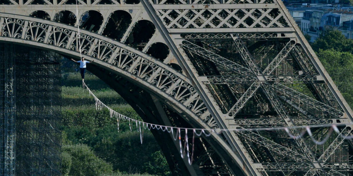 French daredevil takes hair-raising Seine tightrope walk