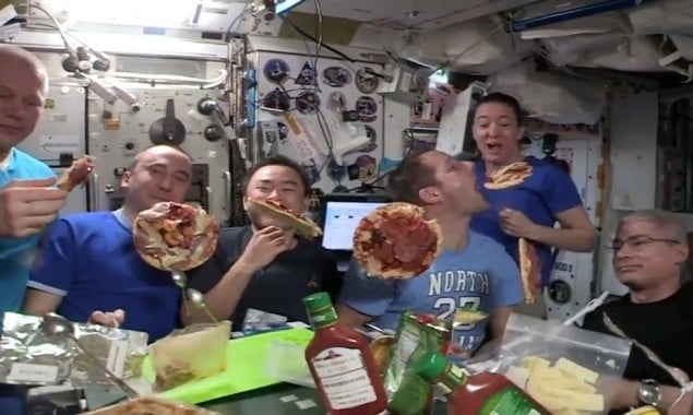 International Space Station: Astronauts eat floating pizza in space