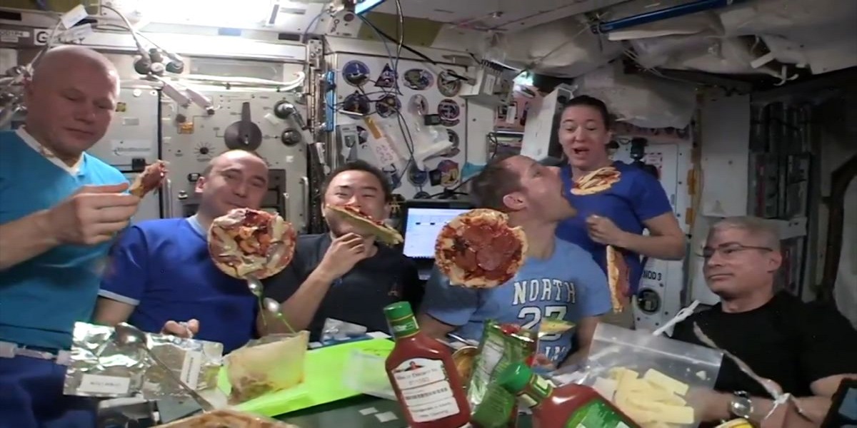 International Space Station: Astronauts eat floating pizza in space
