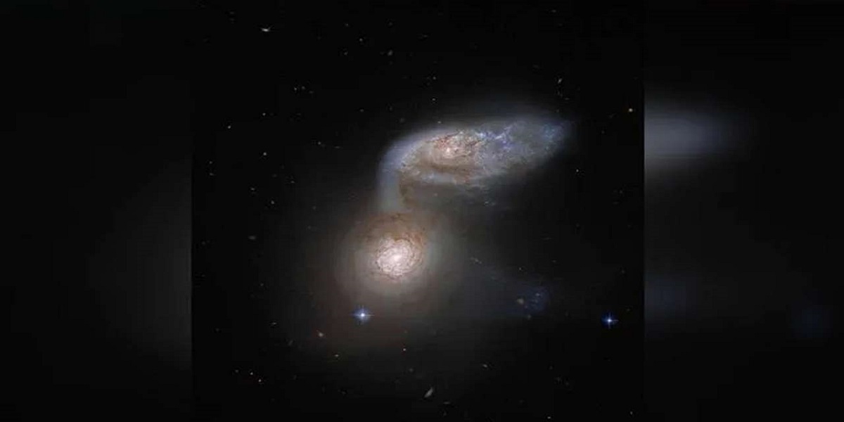 Netizens are astonished by NASA's image of two spiral galaxies dancing together