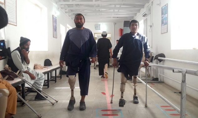 Afghan young man loses leg by stray bullet, seeks rehabilitation