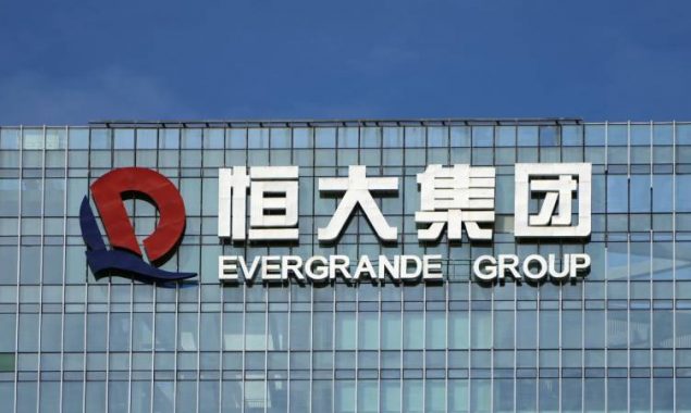 Evergrande to resume trading, warns of financial obligations