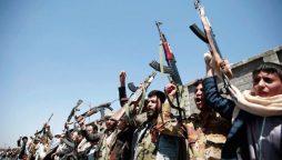 Tribesmen loyal to Houthi rebels, hold their weapons as they chant slogans during a gathering aimed in Sanaa, Yemen.