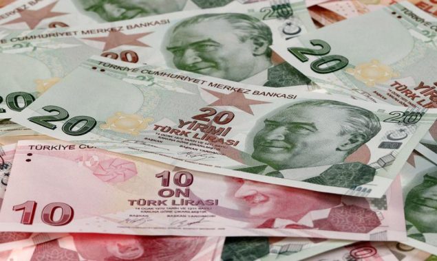 Turkish lira slides ahead of likely interest rate cut