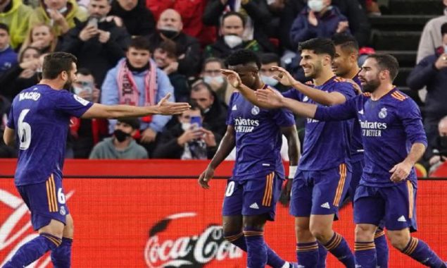 Real Madrid cruise past Granada to return to top of La Liga