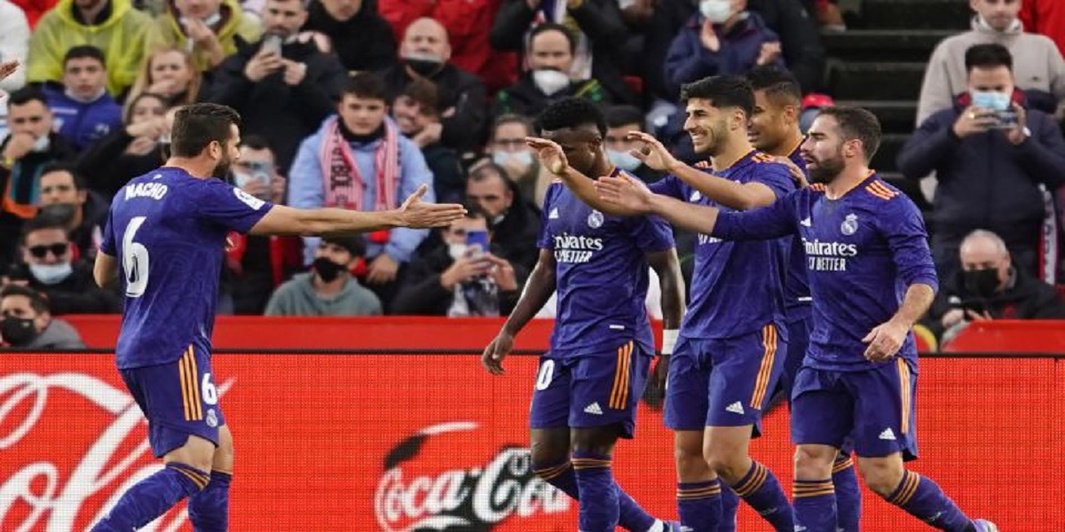 Real Madrid cruise past Granada to return to top of La Liga