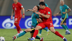 China hold Australia but face uphill task to reach World Cup