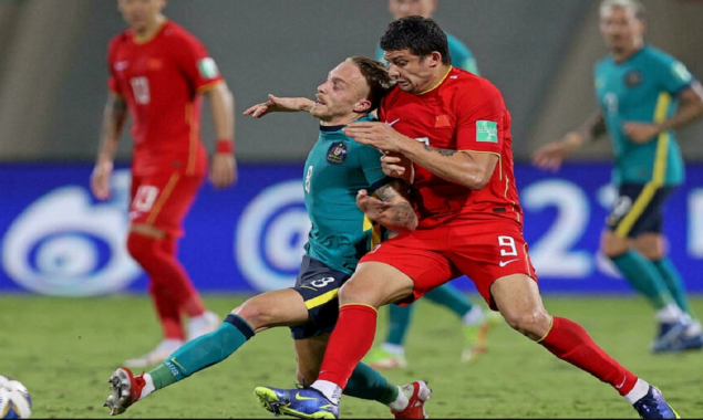 China hold Australia but face uphill task to reach World Cup