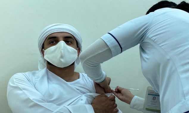UAE says 100% of population received one Covid jab