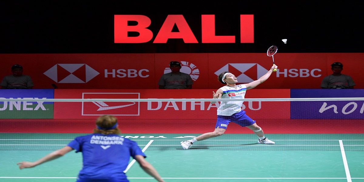 Badminton ace Momota claims first post-crash international trophy