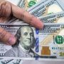 Dollar touches historic high at midday in interbank market