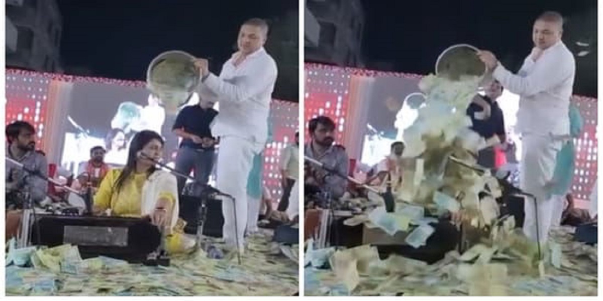 Bucketful of cash poured on Gujarati folk singer during a performance