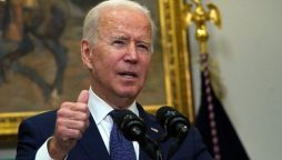 Biden hails key vote on social spending bill as 'giant step'