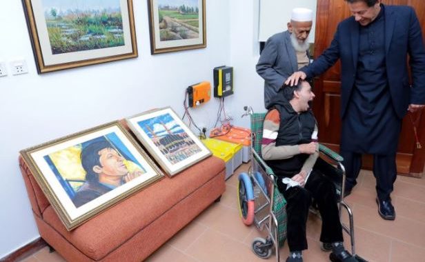 Artist suffering from cerebral palsy gifts PM Imran portraits