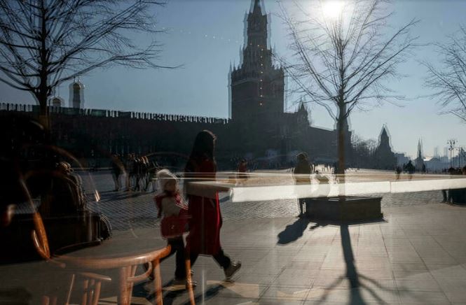 Russia warns of strain on doctors as virus spreads