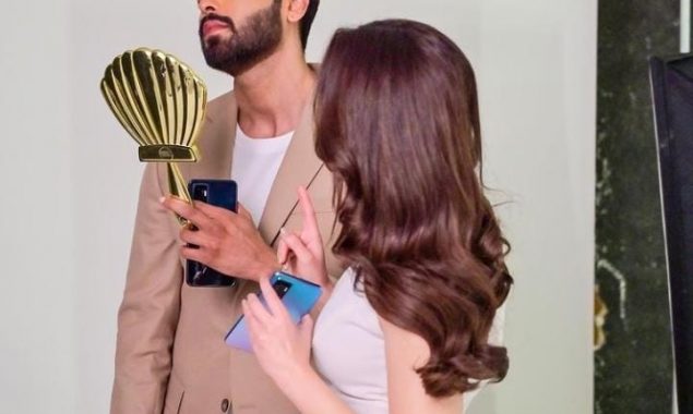 Who is Fahad Mustafa with?