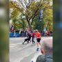 Two runners help the man who falls 200m from NYC Marathon finish line