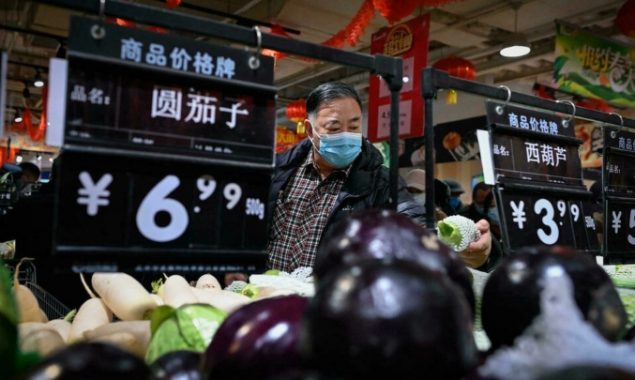 ‘Stock up’, China says, amid new Covid outbreak