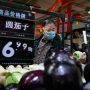 ‘Stock up’, China says, amid new Covid outbreak