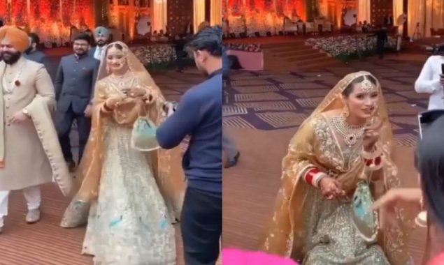 Bride and Groom dance at their wedding when their favourite song plays by DJ