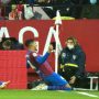 Araujo grabs a point for Barca at 10-man Sevilla