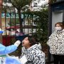 China outbreak prompts major business shutdown, restrictions