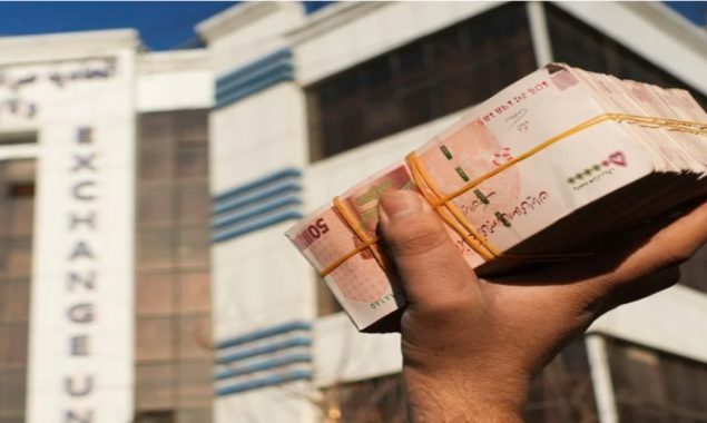 Afghan currency slides, prices surge as economy worsens