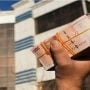 Afghan currency slides, prices surge as economy worsens