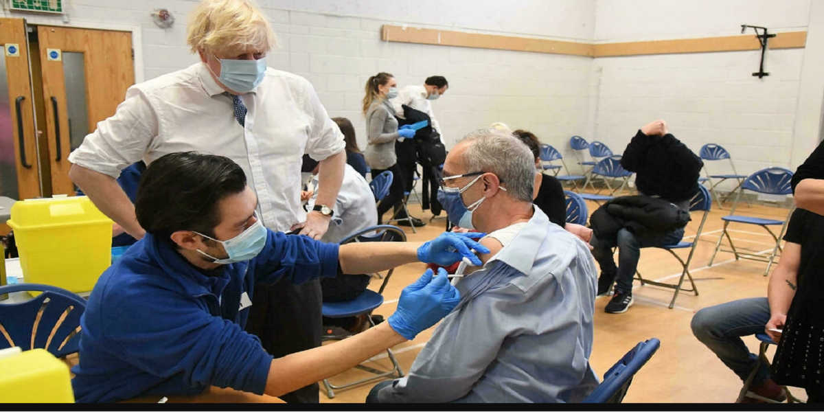 At least one dead from Omicron as UK boosts response